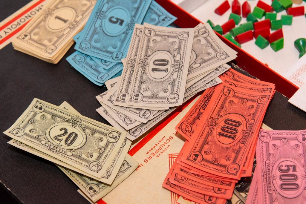 A table with money and dice on it