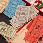 A table with money and dice on it